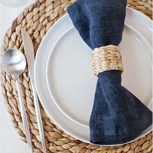 Woven charger placemats made from water hyacinth.